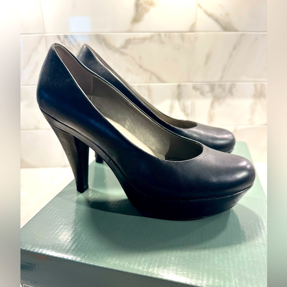 Black leather platform shoes, designed by ME TOO